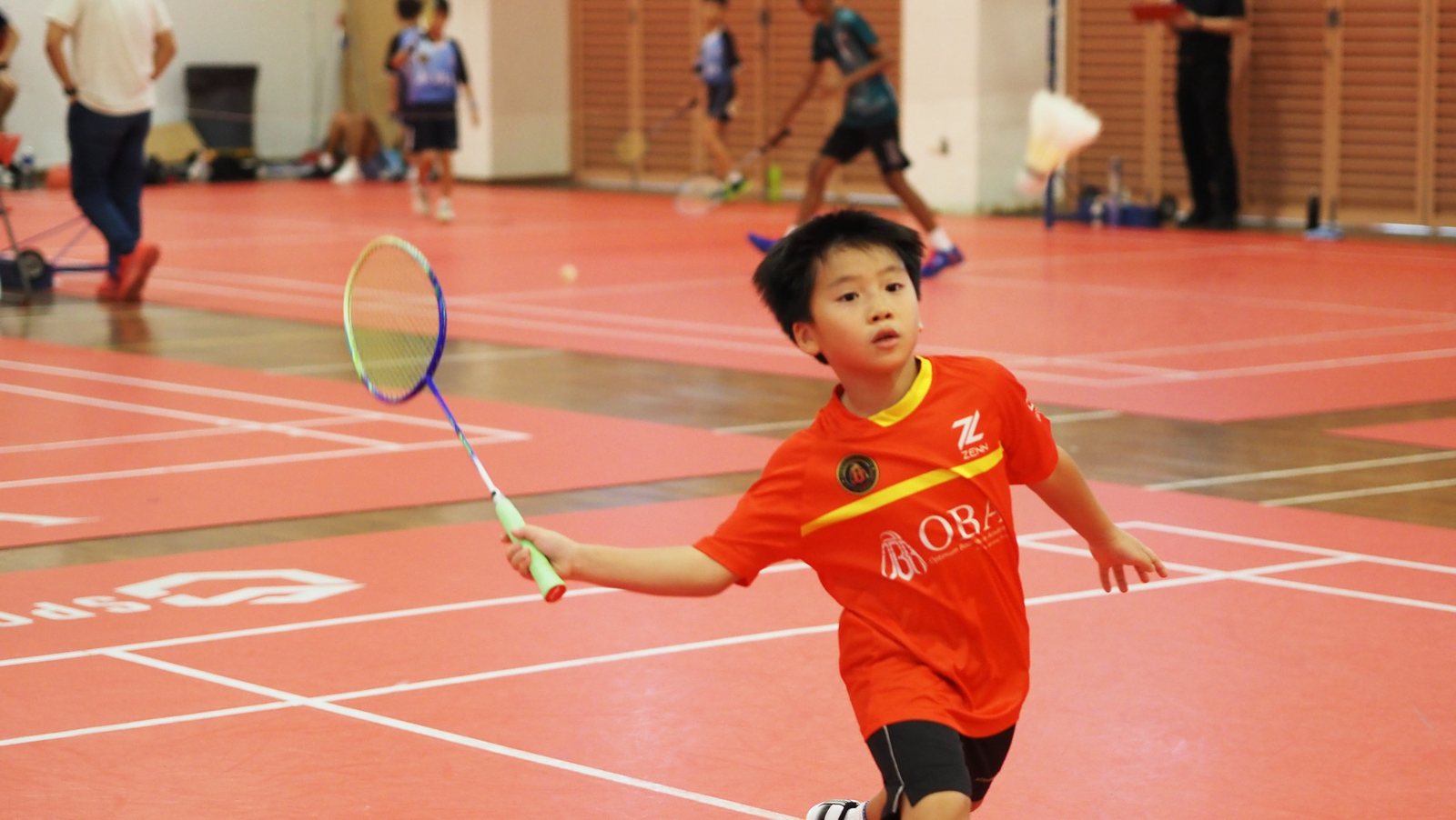 Camper playing a forehand shot during the OBA Cup