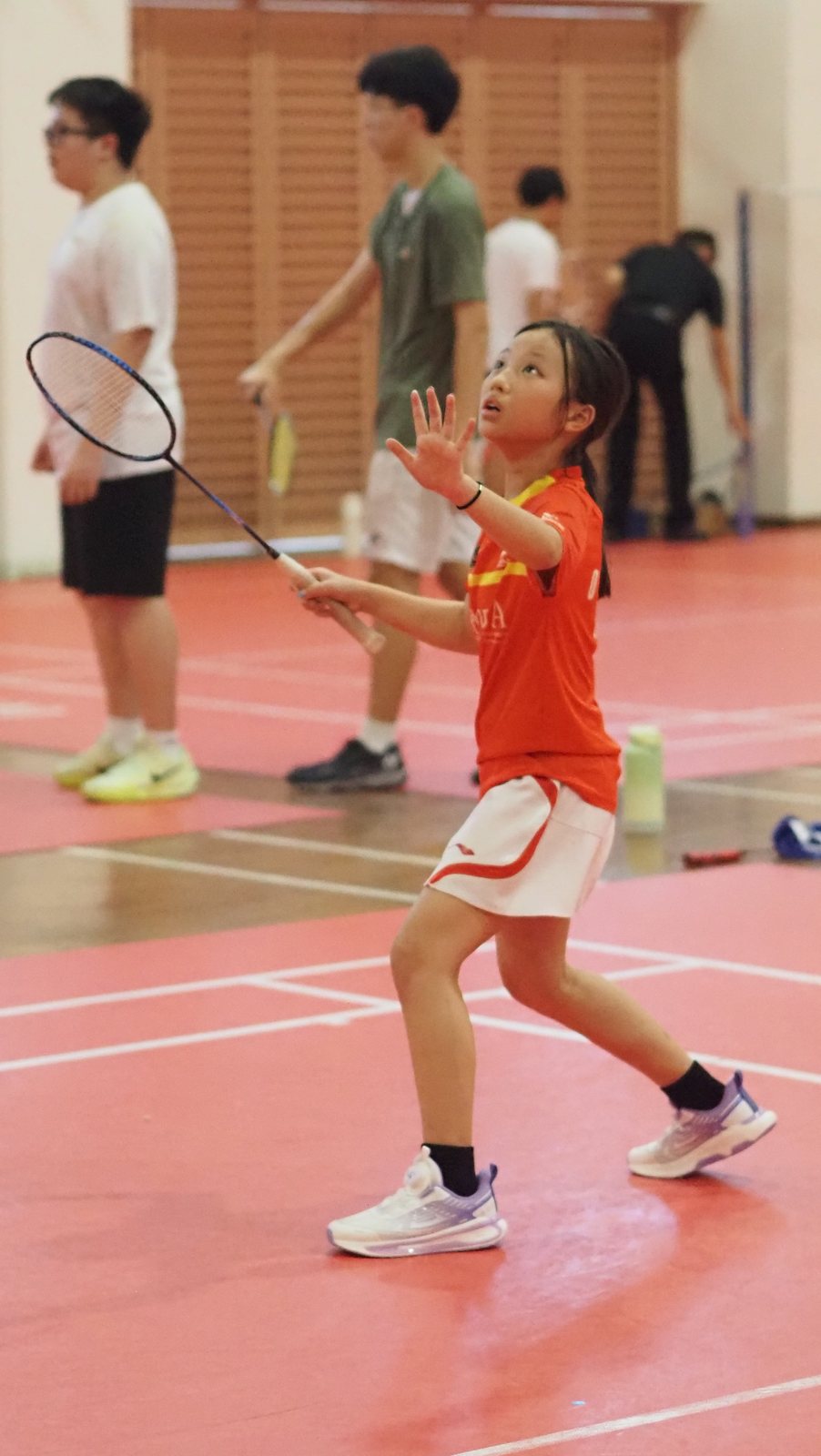 Camper jumping to play an overhead shot during the OBA Cup